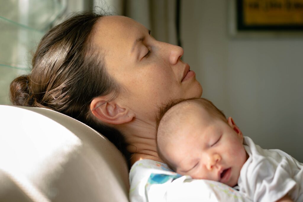 mom taking care of her baby at home.